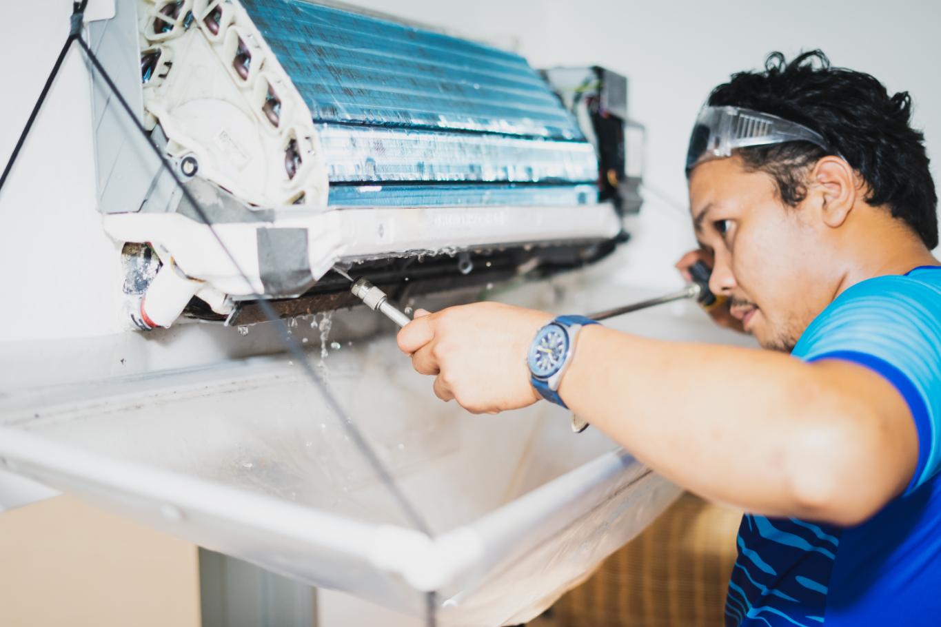 HVAC technician performing deep cleaning service
